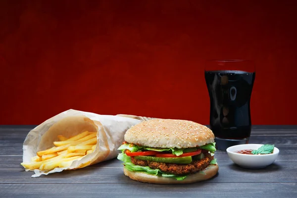 Fast food take away. Hamburger, cola and fries.