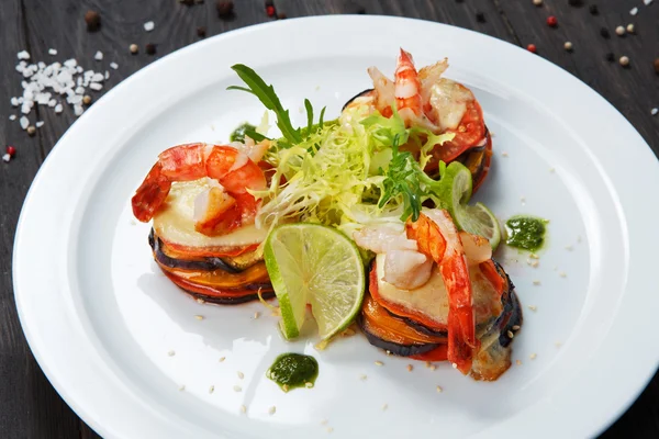 Healthy restaurant food. Ratatoille with shrimp