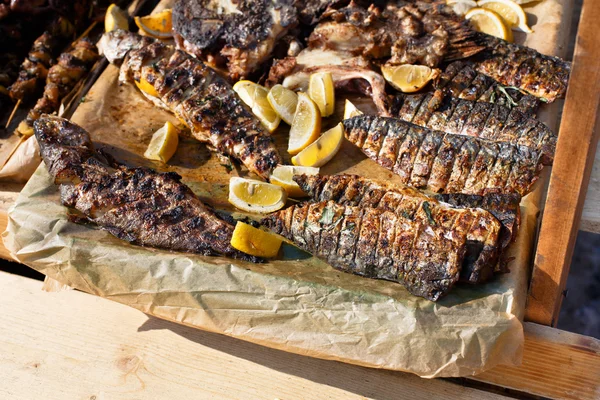 Seafood, fish mackerel grilled at barbecue