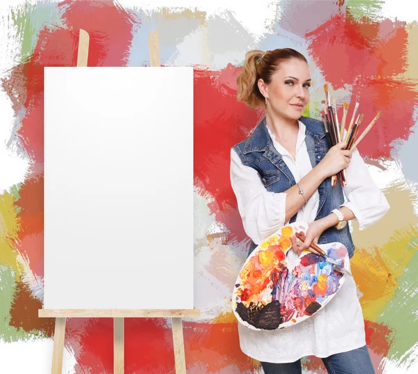 Woman artist with brushes, palette and copy space