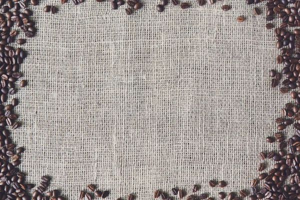 Burlap texture with coffee beans border
