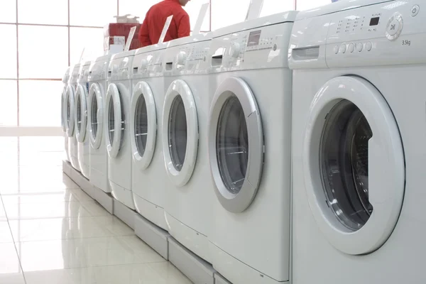 Rows of clothes washers in a store 2