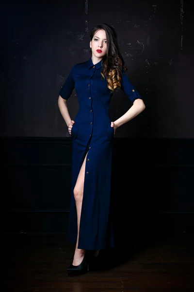 Woman in navy blue dress