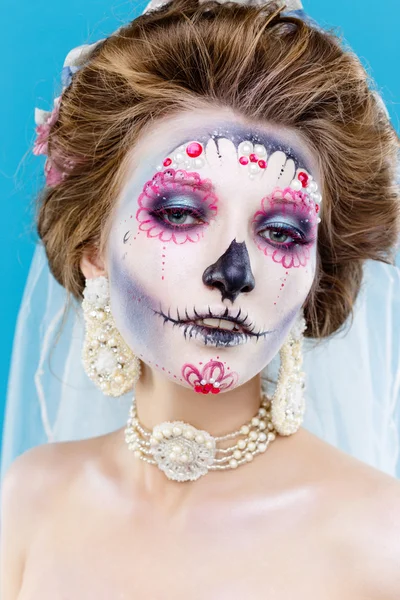 Woman with sugar skull makeup