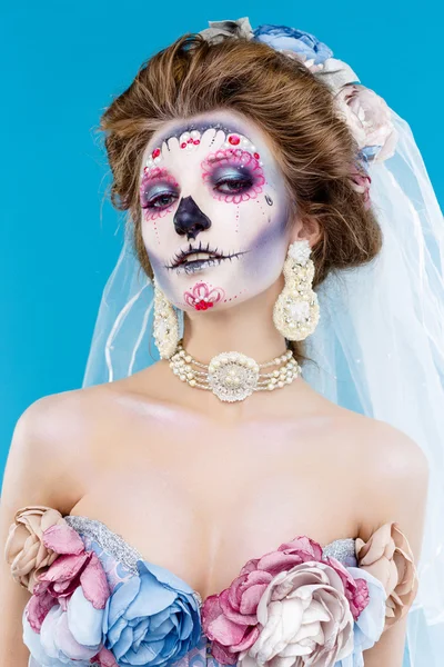 Woman with sugar skull makeup