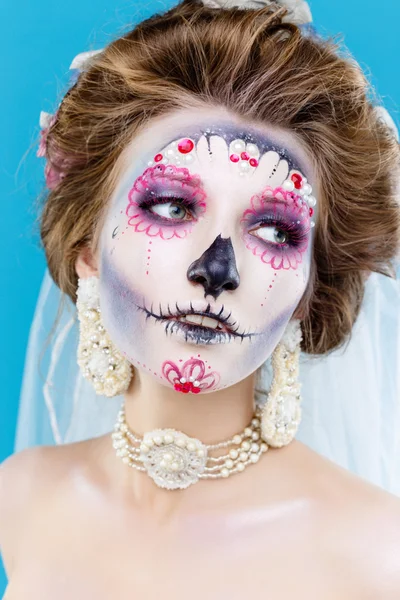 Woman with sugar skull makeup