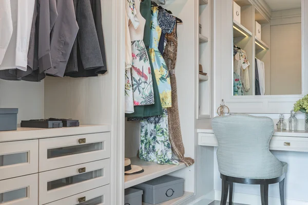 Wooden wardrobe with dressing table and chair