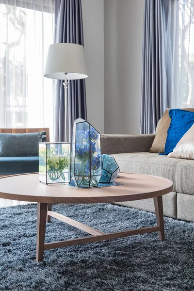 Modern living room with wooden round table