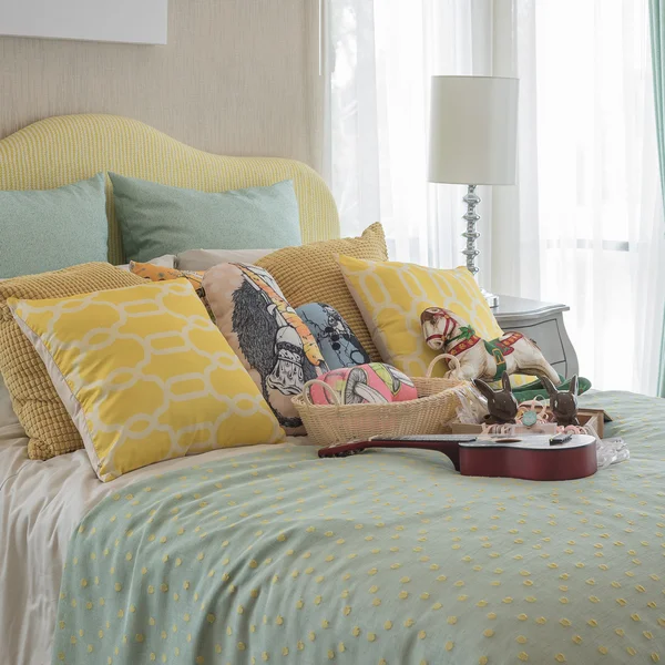 Colorful bedroom with colorful bed and pillows