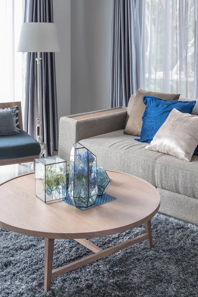 Modern living room with wooden round table