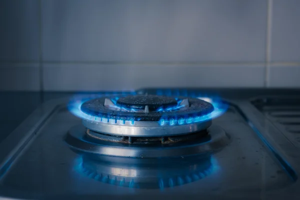 Blue gas burning from old kitchen