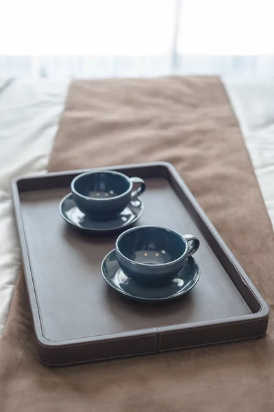 Tray of black empty black coffee cup