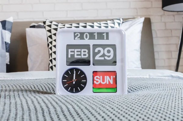 Modern alarm clock in modern bedroom