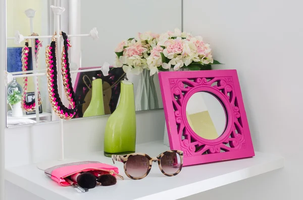 Female accesories on dressing table