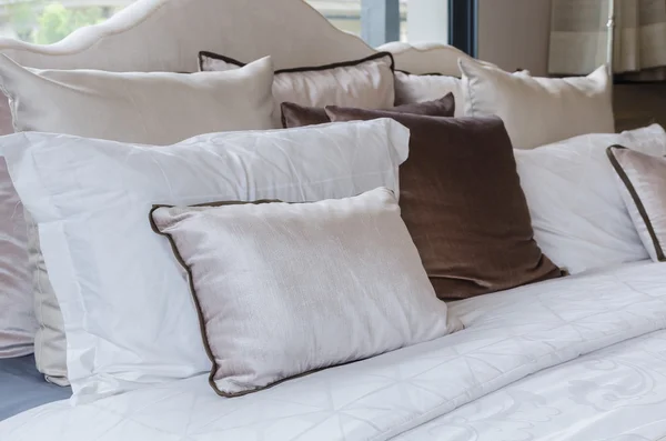 Pillows on bed in modern bedroom