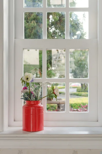 Vase of flower with window frame