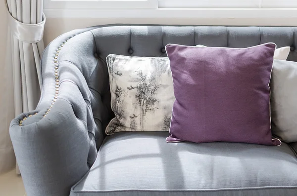 Purple pillow on classic sofa style in living room