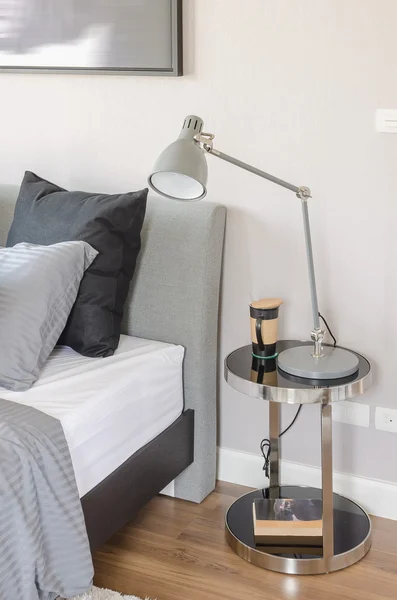 Modern bedroom with modern grey lamp