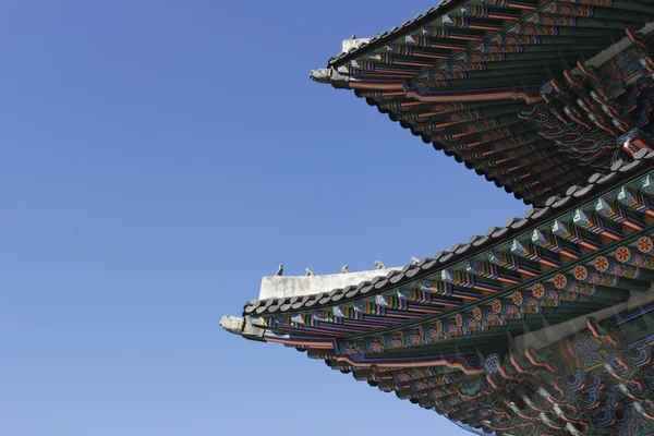 Gyeongbokgung roof layers with animal on top historic architectu