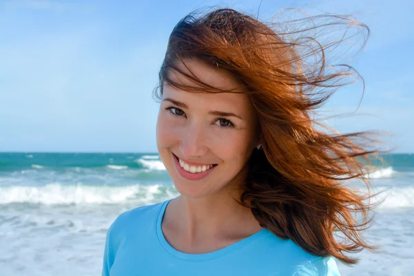 Young attractive woman at the beach
