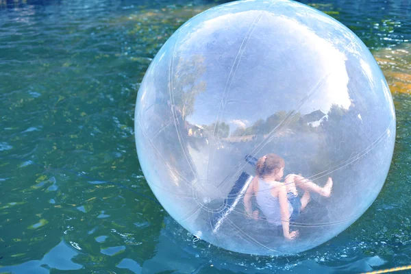 Children Playing in the water ball