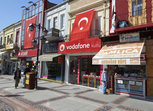 EDIRNE, TUKKEY, 02.04.2016. View to crowded street with shops, hotels, transport and people in Bazaar Edirne