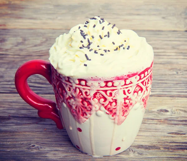 Hot cocoa drink cappuccino with whipped cream