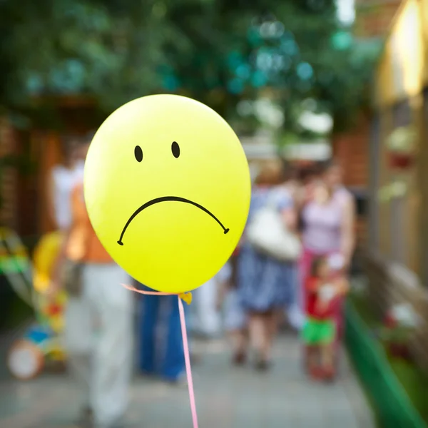 Yellow upset face balloon