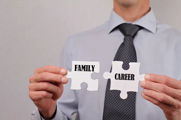 Business Man balance between family and career