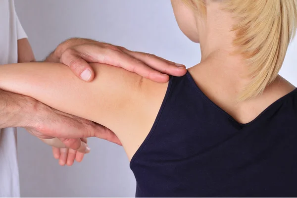 Chiropractic, osteopathy, dorsal manipulation. Therapist doing healing treatment treatment on woman\'s body . Alternative medicine, pain relief concept