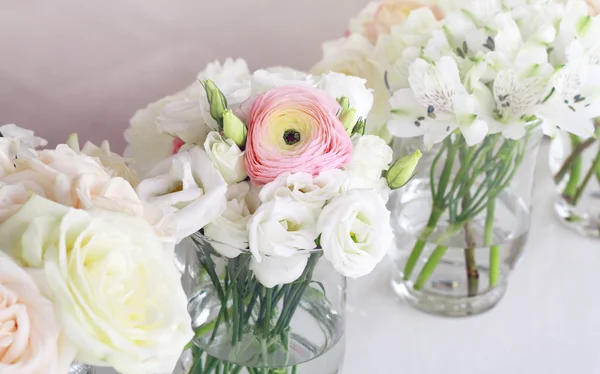 Wedding flower arrangement , pink ranunculus, white roses