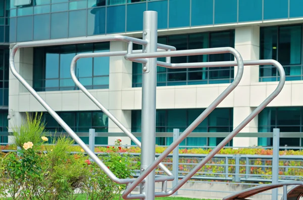 Outdoor gym in front of office building. Sport, fitness, active lifestyle concept