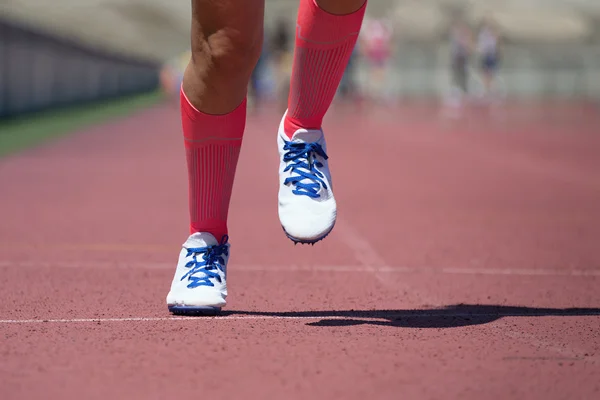 Athletics people running on the track field