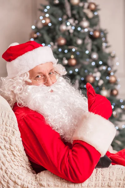 Cheerful Santa Claus is expressing positive emotions