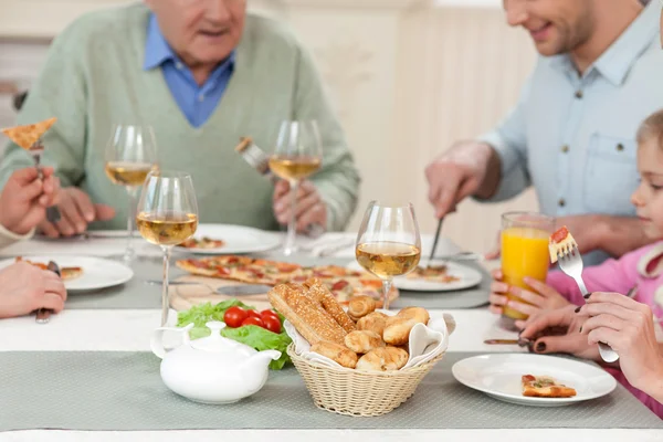 Pretty friendly family has a dinner together