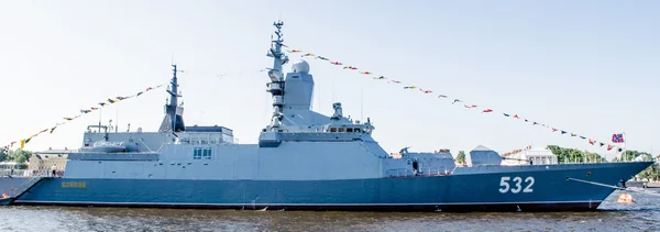 Warship on the feast of the Navy of Russia in St. Petersburg on the river Neva