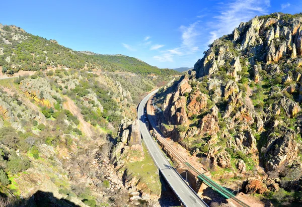 Highway and railway crossing Despenaperros national park in Nort