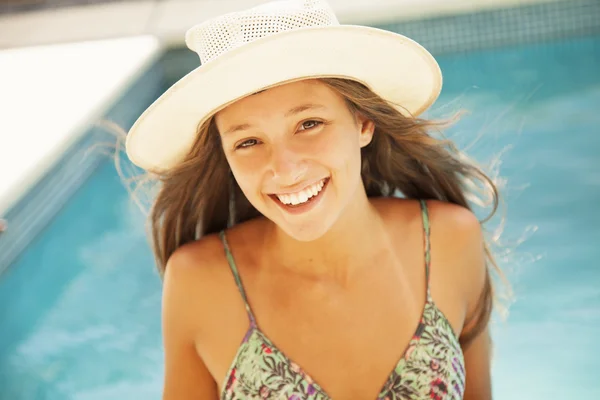 Girl in hat smiling