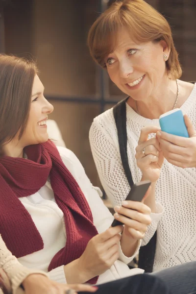 Women using phones