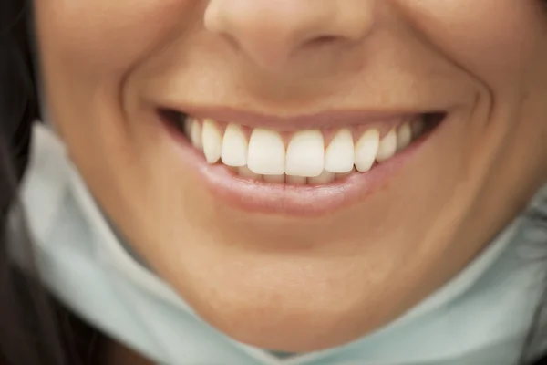 Female dentist smiling