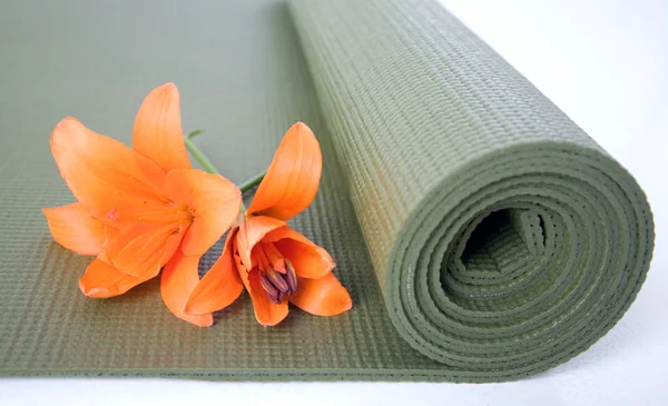 Flowers on yoga mat