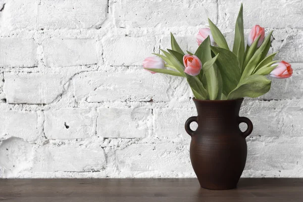 Pitcher with tulips