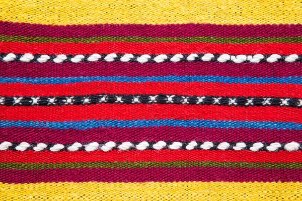 Bulgarian hand woven woollen rug in a bright striped pattern