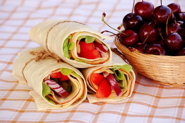 Wrap sandwiches on table cloth