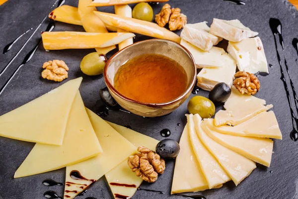 Cheese Platter, snacks and honey, horizontal