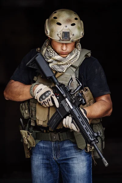 Terrorist during the special secret operation on dark background