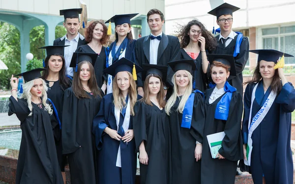 Graduation, Students, Education. Group of European Graduating Students Celebrating