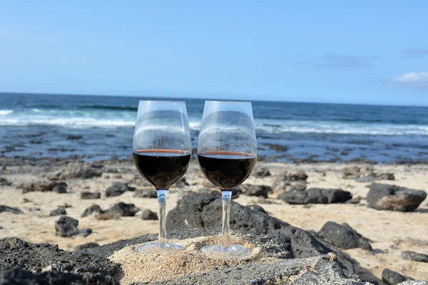 Two Glasses Of Wine On The Beach In Paradise Island