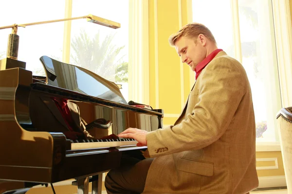 Young pianist at an afternoon lounge