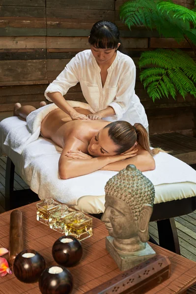 Asian back massage theraphy spa hot stone